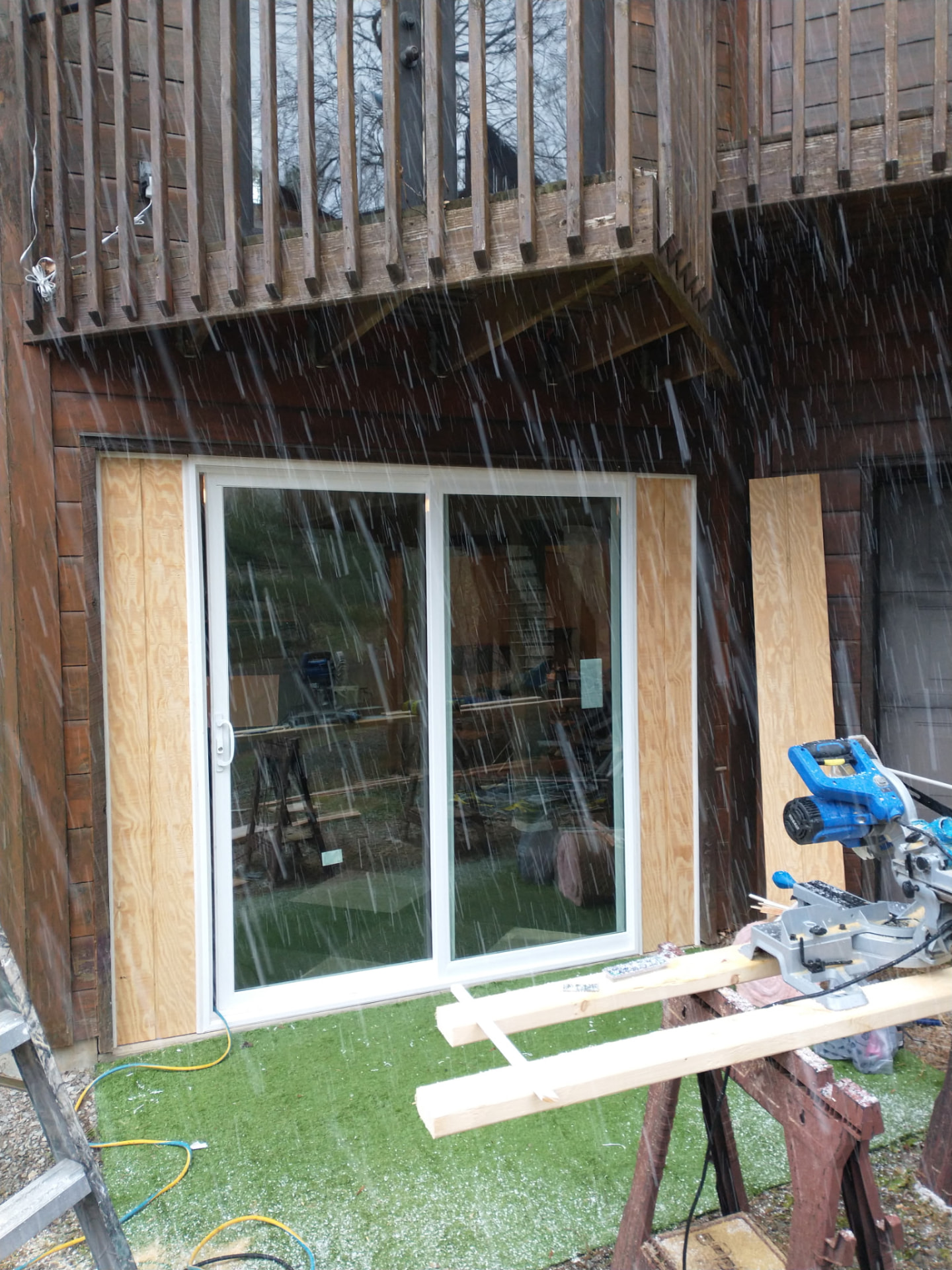 New sliding patio door installed in an exterior wall